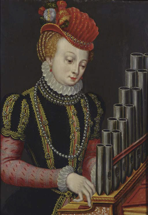 A lady playing an organ by an artist from the circle of Flemish painter Frans Floris, also known as 