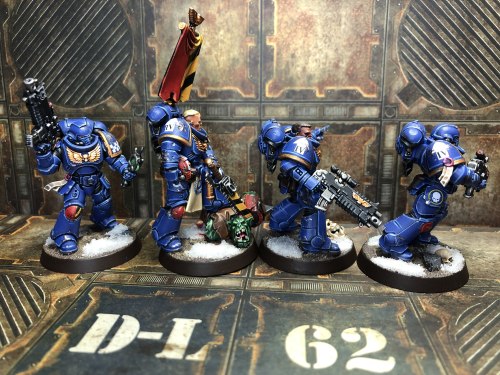 a-40k-author:cam2d:Ultramarines Intercessors, sans a guy who got melted by plastic glue.They’re perf