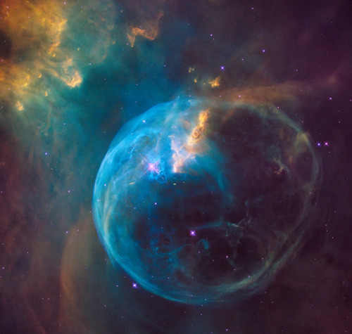 NASA/ESA/Hubble Heritage Team - A photo of the Bubble Nebula, a rapidly expanding sphere of hot gas 