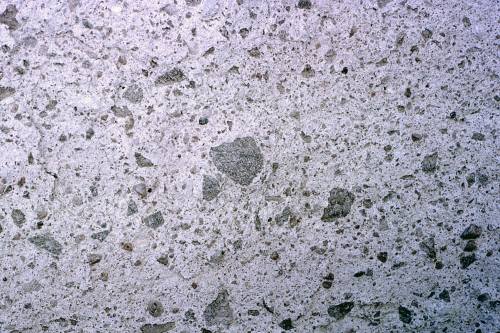Pumice and ash This is a welded tuff; an igneous rock erupted from a volcano. It’s made of a c