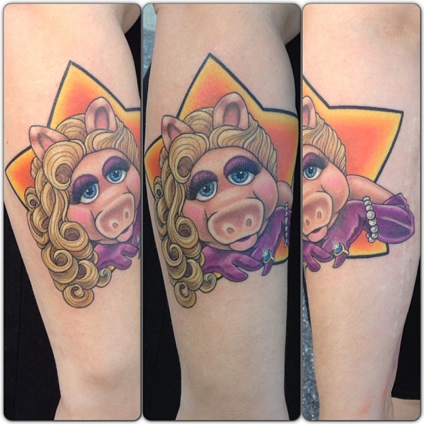 She has Miss Piggy tattooed on her arm lol   9GAG