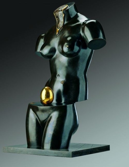 dappledwithshadow:Salvador Dalí  Space Venus, 1984 Bronze in green and gold patina is divided into