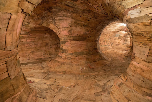 cross-connect:  reblog via littlelimpstiff14u2: Artist Henrique Oliveira Constructs a Cavernous Network of Repurposed Wood Tunnels at MAC USP Brazilian artist Henrique Oliveira (previously) recently completed work on his largest installation to date