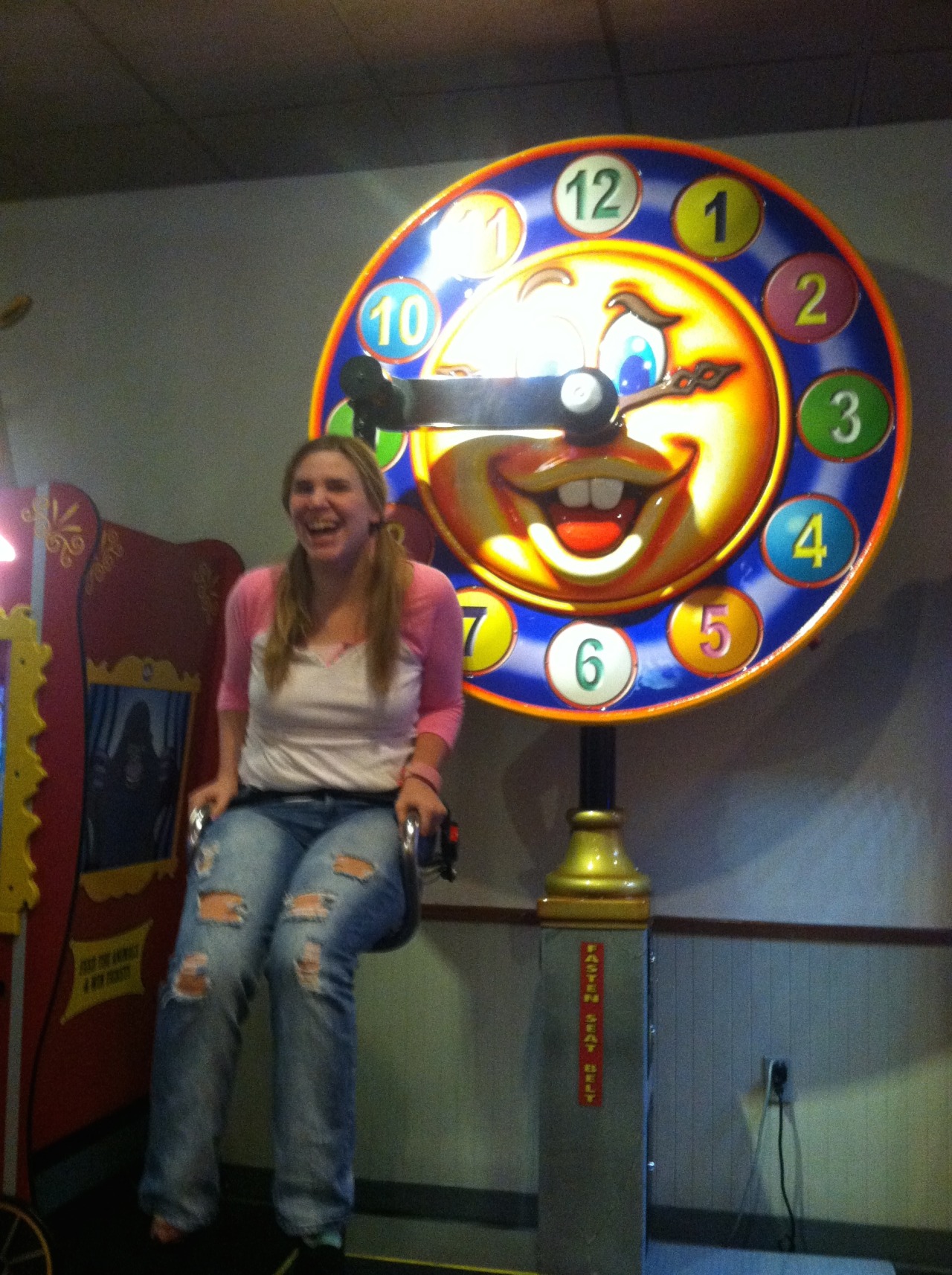 Riding the rides at Chuck E Cheese. 