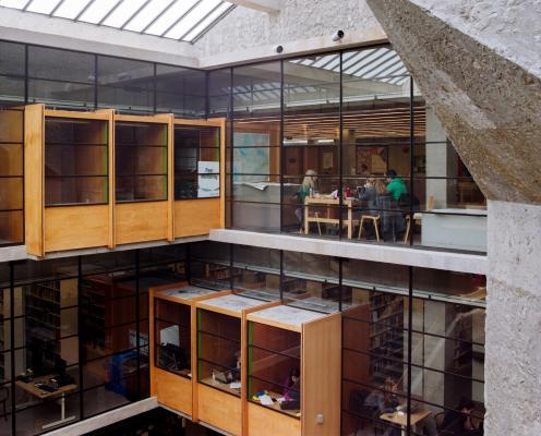 Bata Library: interiors use wood and glass as a counterpoint to the concrete façade of the bu