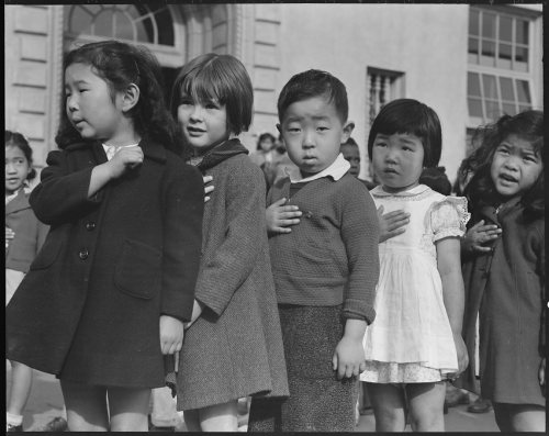First-graders recite the Pledge of Allegiance at their school in San Francisco. People of Japanese a