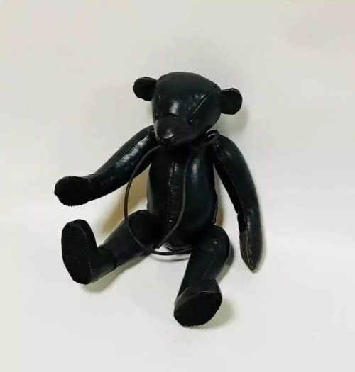 ourladyofperpetualnaptime:comme des garçons leather bear toy with straps, 1988