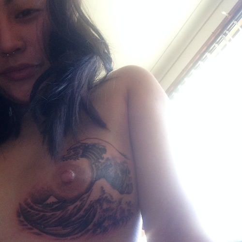 girlswithstamps:  this is me, with my new tattoo done yesterday, great wave off kanagawa. mewfuck