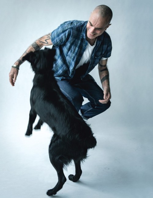photographicpictures:Here’s Daniel Day Lewis jumping with a dog, photographed by Tim Walker, cause *
