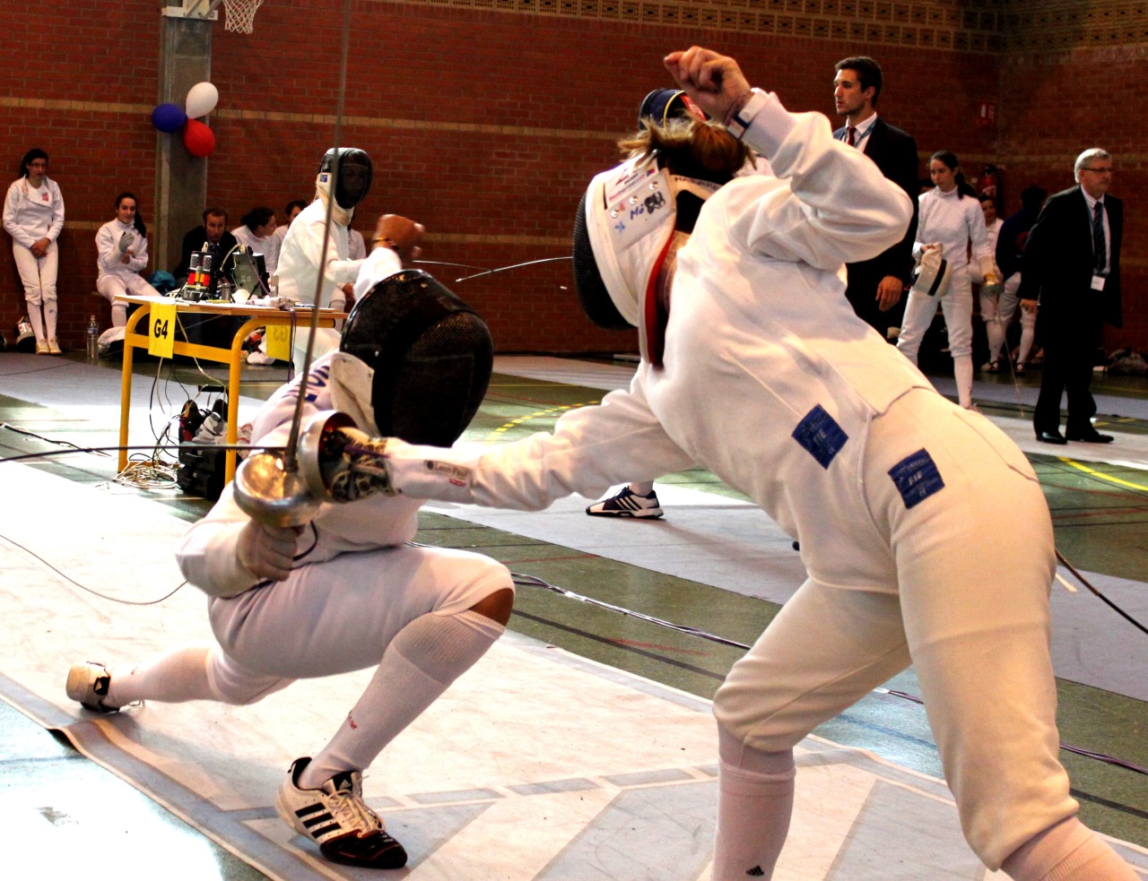 modernfencing:[ID: two epee fencers in a bout. The fencer on the right has her blade