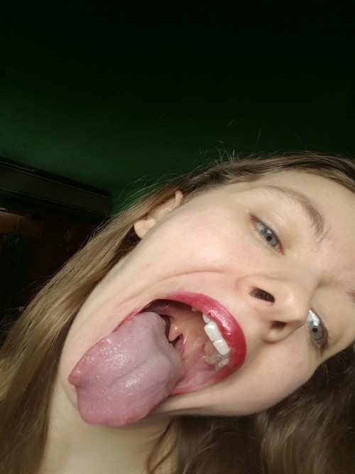 Tongues Out adult photos