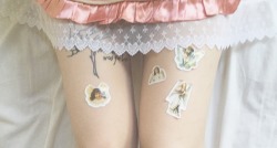 milliedollgraves: i covered my legs in tiny angel stickers ♡ 