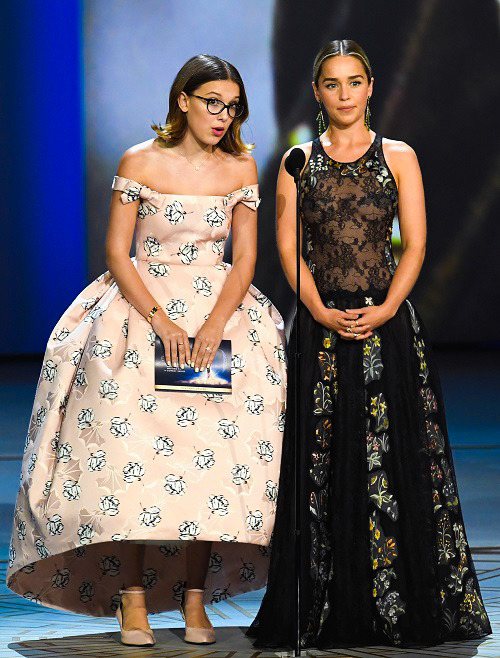 adoringemiliaclarke:Emilia Clarke &amp; Millie Bobby Brown speak onstage during