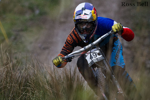 freshlabvisual: Loic Bruni speed tucking into the finishing arena at this past weekends wet and wild