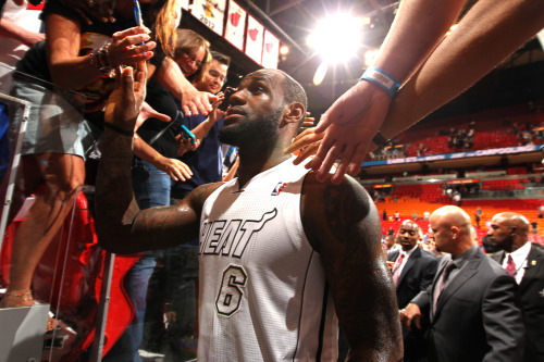 nba:  LeBron James of the Miami Heat exits the court after the game between the Philadelphia 76ers and the Miami Heat on April 6, 2013 at American Airlines Arena in Miami, Florida. (Photo by Issac Baldizon/NBAE via Getty Images)