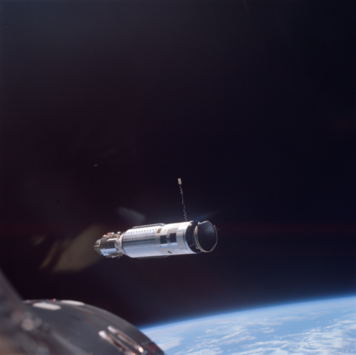 humanoidhistory:  High above Earth, the Agena target vehicle gets closer and closer to the Gemini 8 space capsule, March 16, 1966. (NASA/ASU)