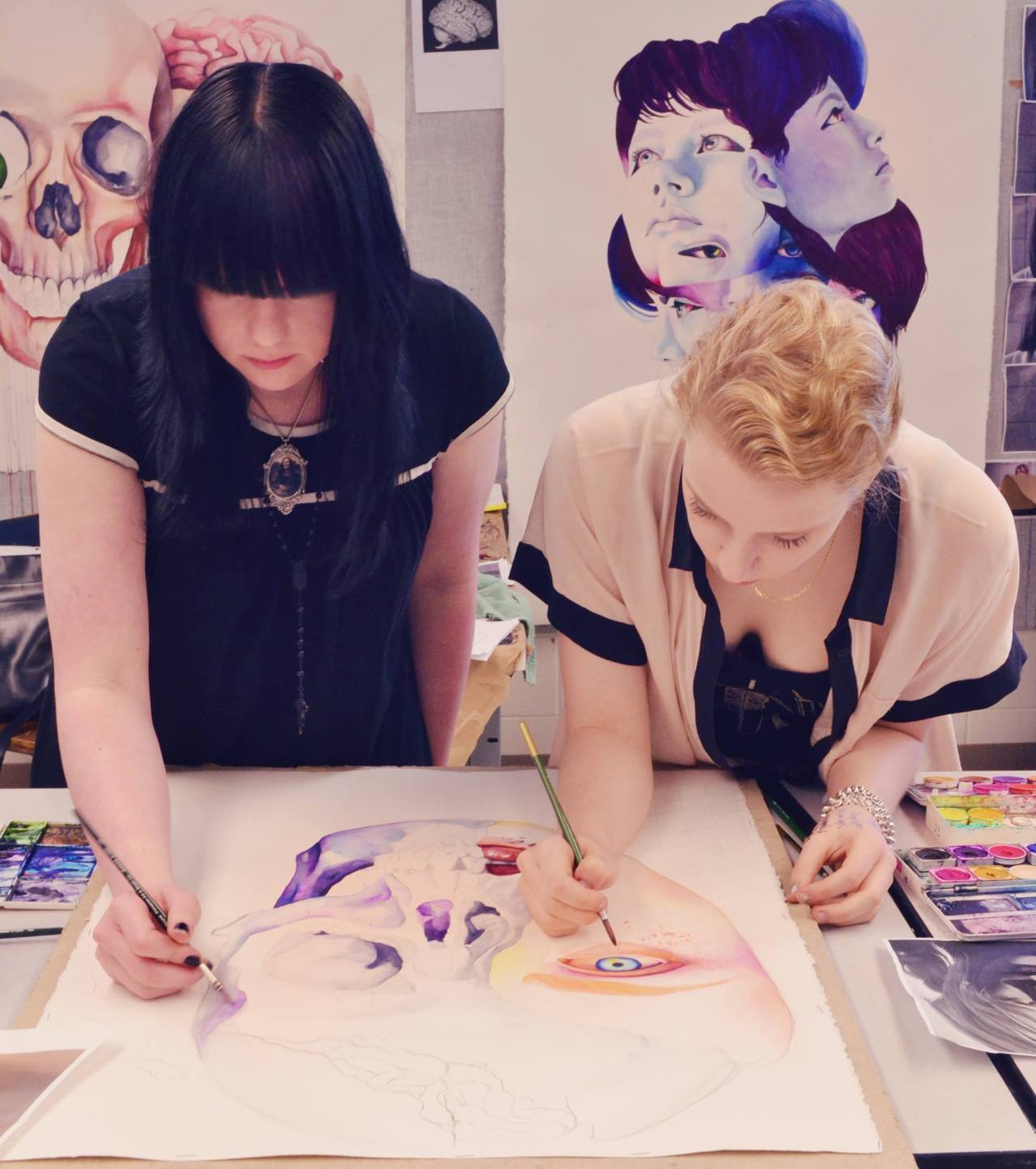 sicksweetness:  Batskulls and I in action. &gt;;) (notice our fridge-sized paintings