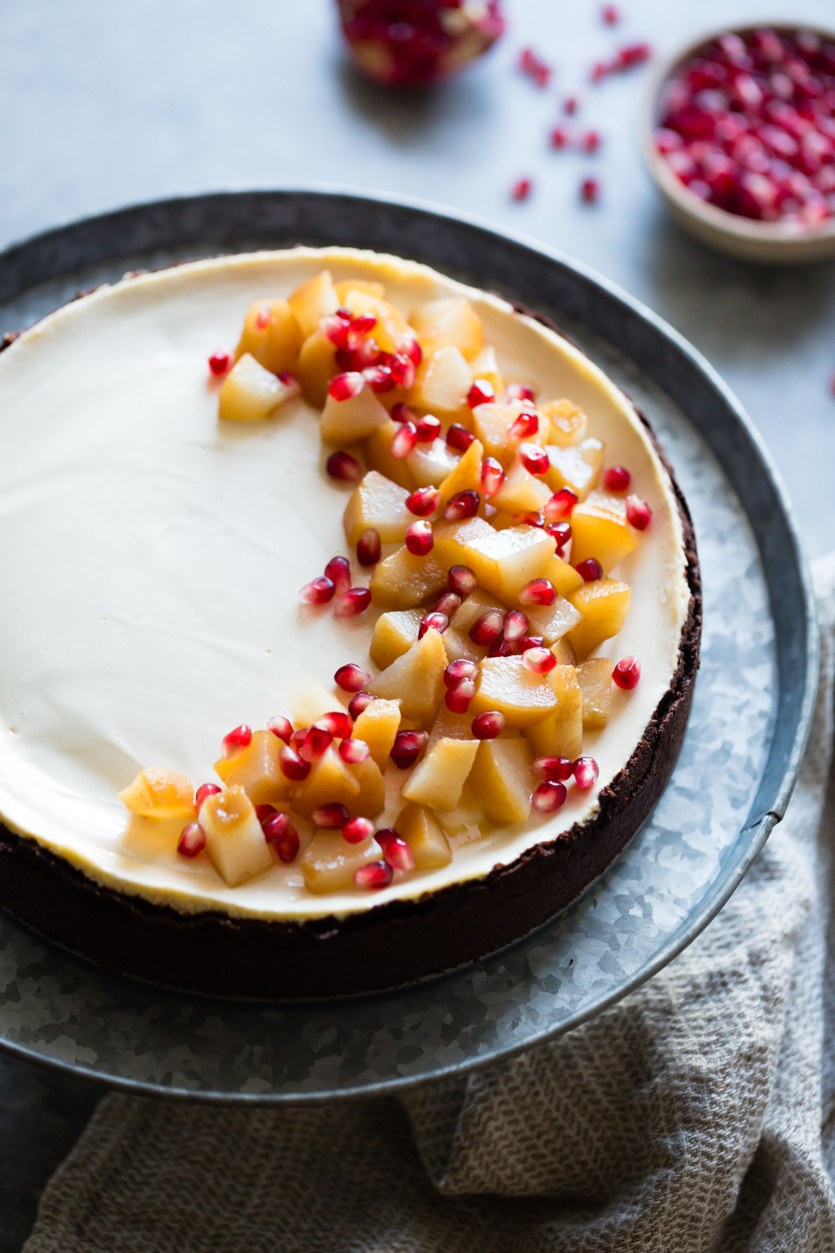 guardians-of-the-food:Chocolate Crusted Chevre Cheesecake with Earl Grey Poached