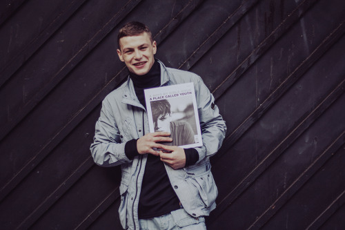 Ben Horsfield at Elite Models London stops to pose with the new issue &lsquo;A Place Called Youth&rs