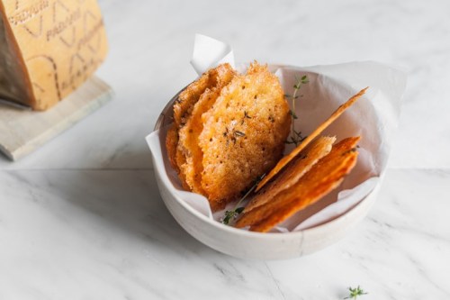 Grana Padano crisps with thyme and pink pepper