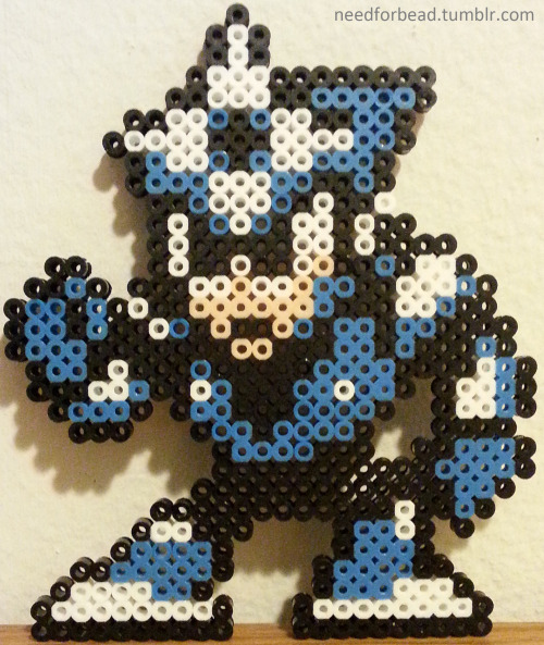 Mega Man:  Shadow ManMega Man and all related characters are owned by Capcom.For more Mega Man perle