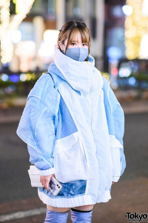 Japanese graphic designer Nene on the street in Harajuku wearing an oversized jacket by Japanese fas