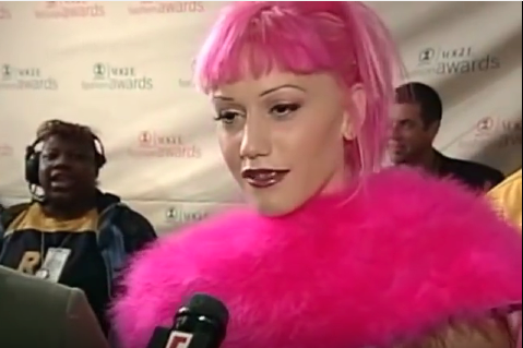 psychojello:  Gwen Stefani serving braces + pink hair, 1999 [x]