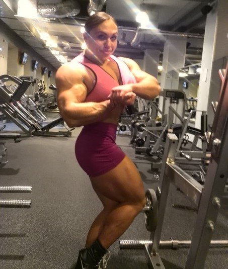 zimbo4444:  ..Natalia Trukhina..”The World’s Most Muscular Woman”..super strong & super beautiful & only 24yo..slightly over 5'5” tall 211 lbs & has over 18″ biceps.. 💪🏼😺👍🏼 ..Jr. proudly says..”my Mom can beat up