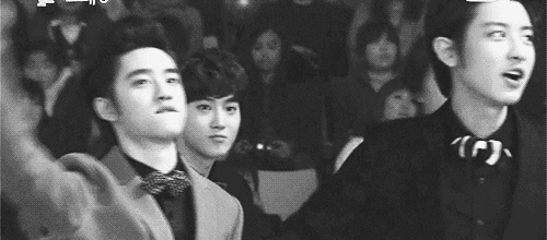  chanyeol’s cute shy smile after realizing he was being filmed   