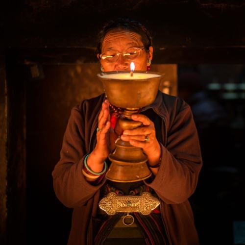 Each morning in the Buddhist temple beside Boudhanath Stupa in...