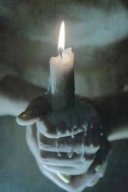 presumably-in-no-kuntrol:  You will hold this candle my girl. You will keep it in your hands allowing the wax to coat your fingers, to fuse your palms together. You will not release it. Instead you will use it to move throughout the darkened home. You
