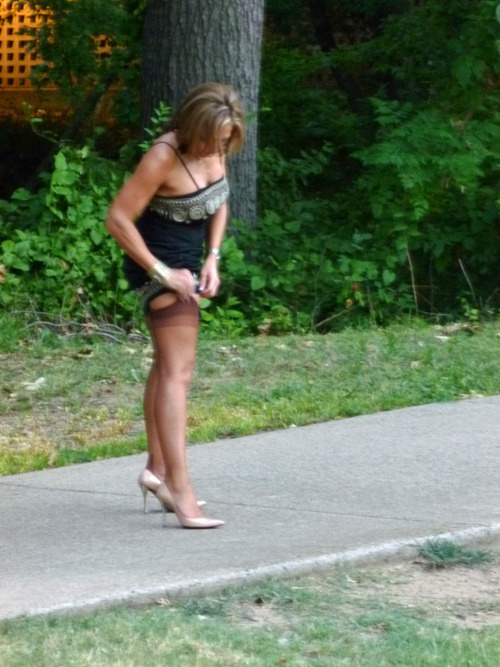 stockings-garters-heels: Garter Adjustment In Public!!! So Hot!!!