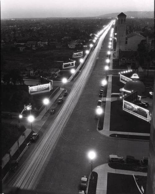 Birdseye view of Wilshire Boulevard, looking west at night, March 28, 1928 - California Historical S