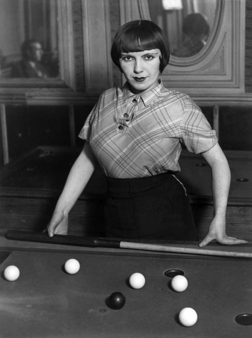 prostitute playing snooker, Boulevard Rochechouart, Paris, circa 1932by Brassaï (Gyula Halász)