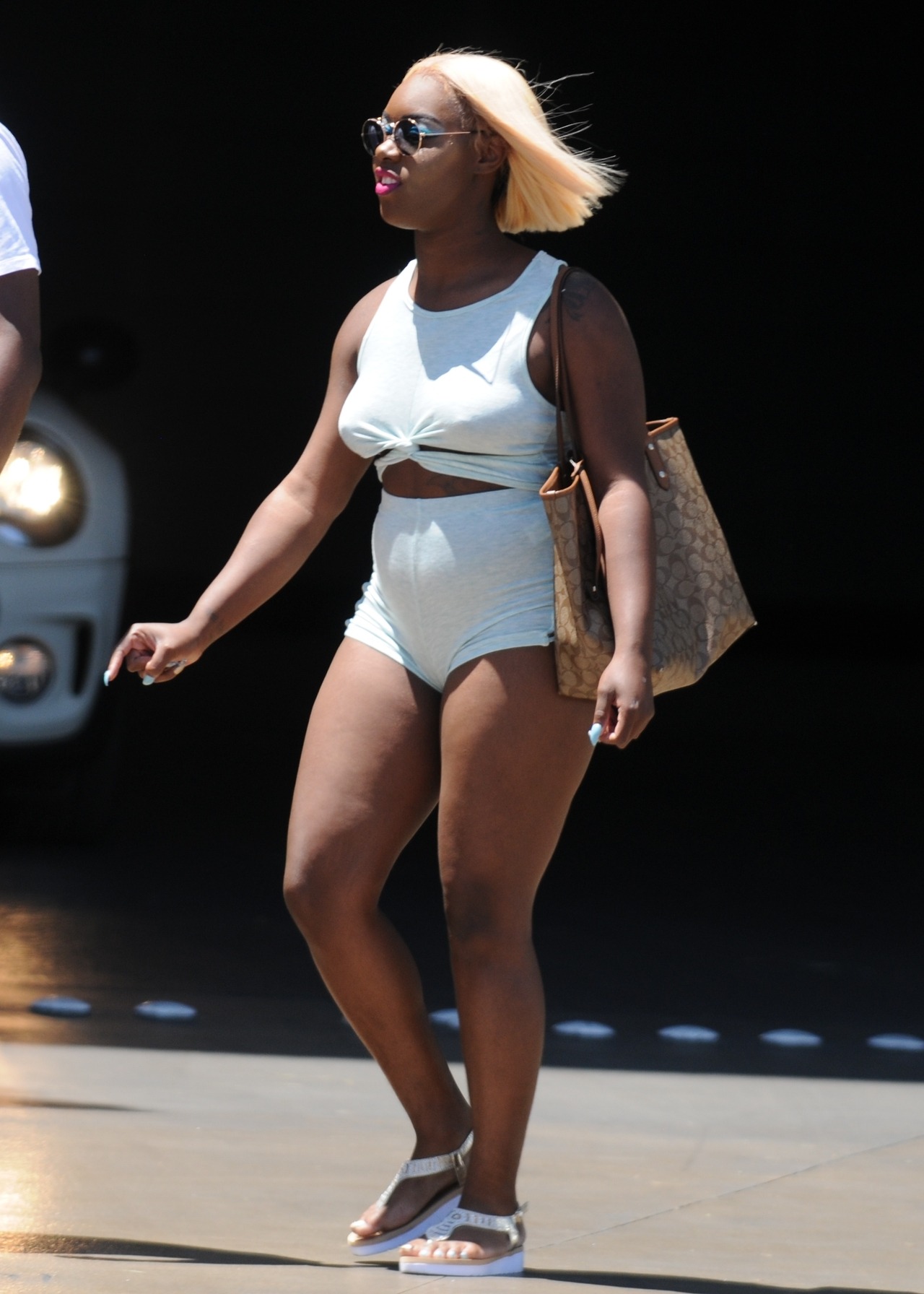 She ain’t wearing anything under that, top or bottoms.