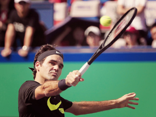 Roger Federer practices with Wu Di ahead of the 2017 Shanghai Rolex Masters - 7 October 2017