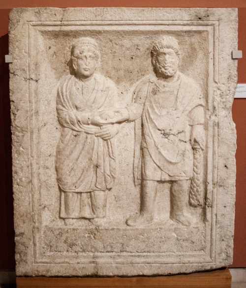 Heracles/Hercules and Hera/Juno after their reconciliation.  Grave monument from the Roman camp