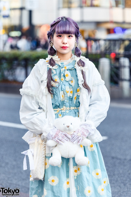 19-year-old Japanese student Rio on the street in Harajuku with purple twintails, a vintage top over