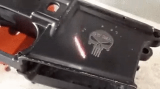 smexymacmilf4:  sixpenceee:  Laser etching a lower receiver. This is beyond cool. (Source)
