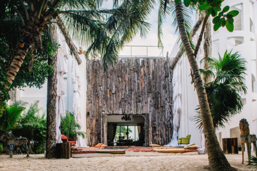 Bark cladding and timber features at Casa MalcaThe property was once owned by Pablo Escobar but is n