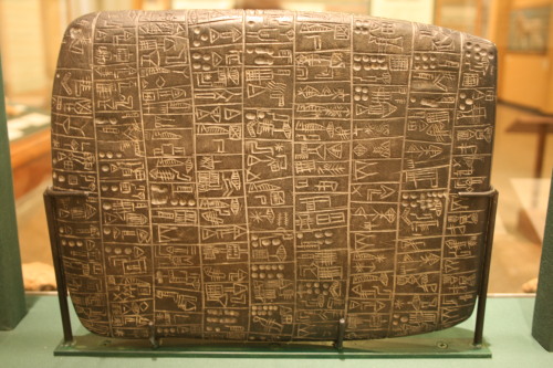 mostly-history: Sumerian cuneiform stone (c. 2600 BC). Probably from Isin. Black basalt. Dimensions 