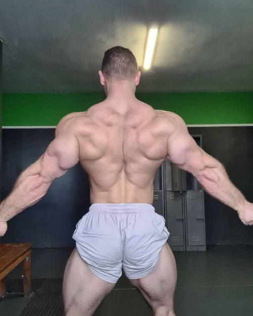 Daddy showing off his powerful back