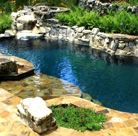 Austin PoolExample Of A Mid-sized Mountain Style Indoor Kidney-shaped Pool Fountain Design With Decking
