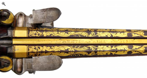 A double barrel flintlock rifle crafted by Joseph LaMotte Laine, France, late 18th century.