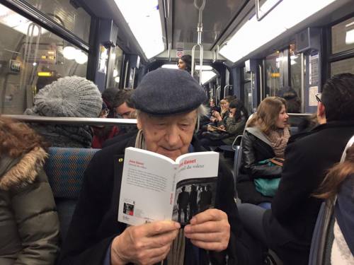 flagblues:Jonas Mekas in the Paris metro, reading Jean Genet’s Journal du voleur, on March the 30th,