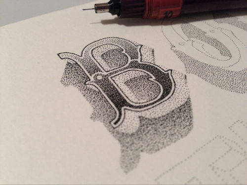 From sketch to final typography made out of 0.01mm dots by Xavier Casalta