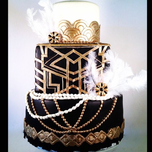 Great Gatsby themed cake! #gatsby #cake #flappergirl #roaring20s #greatgatsby #blackandgold #cake #katiebakeslafayette #feathers #pearls #20sdress #geometric