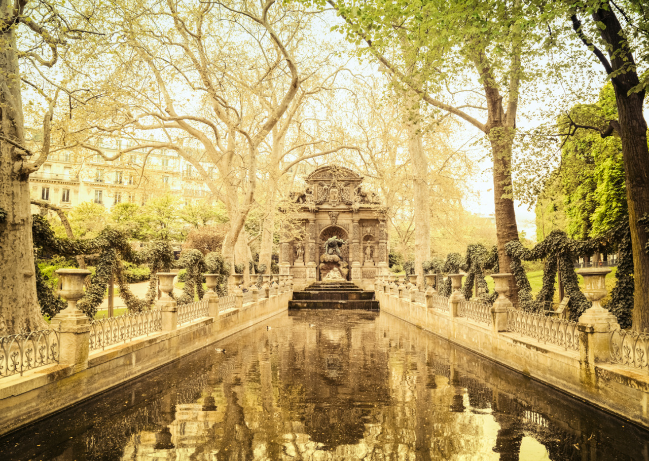 nythroughthelens:
“Paris - The Medici Fountain- Jardin du Luxembourg  —-
Paris is a heady rush: the feeling you get when the earth drops out from under you when eyes meet and lips turn upwards in unison.
There is a heaviness that is etched in its...
