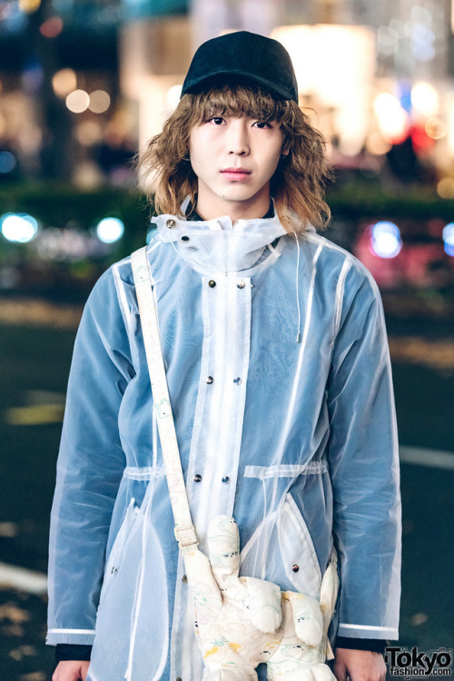 Japanese fashion college student Saga on the street in Harajuku wearing a sheer jacket from Dog Hara