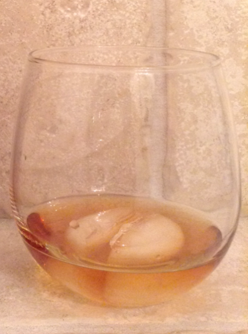 XXX Aforementioned whiskey. Just enough ice to photo